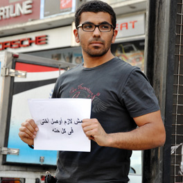 Man holding sign